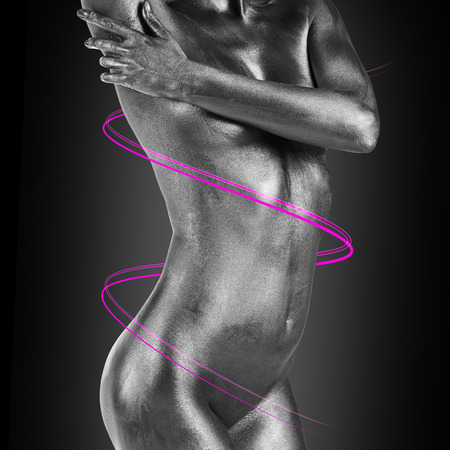 woman with body art posing on the black backgroundの写真素材