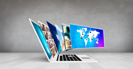 Laptop with many screens stand on the floor.Elements of this image furnished by NASAの写真素材