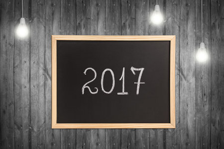 Chalkboard, wooden frame with year isolated on white