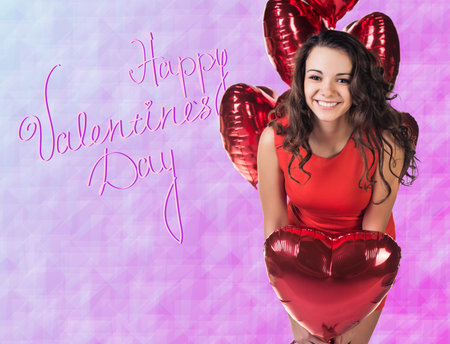 Woman with red valentine baloons