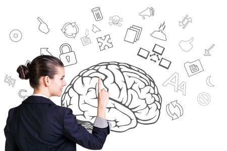 Business woman point to icons on the wall isotaledの写真素材