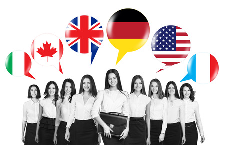 Group of business people talking with foreign speech bubblesの写真素材