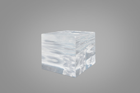 Frost ice cube on the gray background.の写真素材