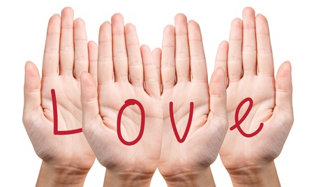 Love writing on hands isolated on white backgroundの写真素材