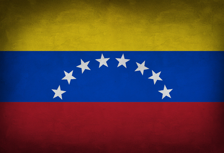 Venezuelan flag painted on the wall. Venezuelan flag backgroundの写真素材