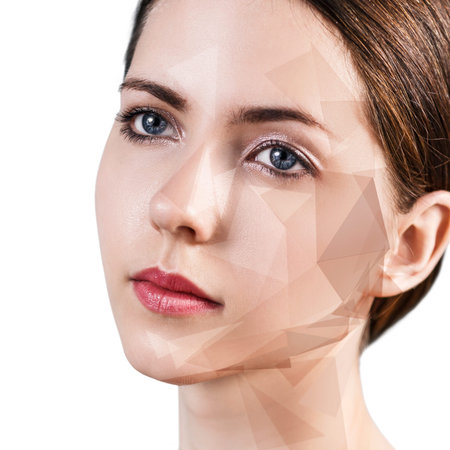 Portrait of young woman with geometrical shapes on face isolated on whiteの写真素材