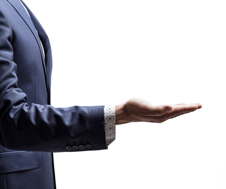 Man shows outstretched hand with open palm.の写真素材