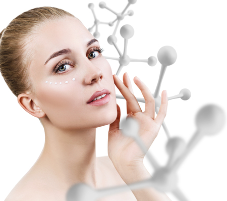 Young sensual woman with big white molecule chain.の写真素材