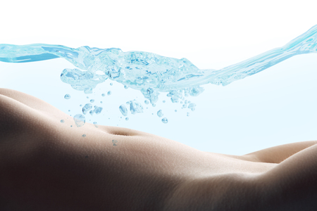 Female slim body under water wave.の写真素材