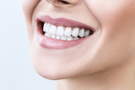 Close-up of smile with white healthy teeth.の写真素材