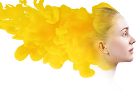 Double exposure portrait of woman face and beige smoke.の写真素材