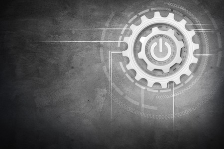 Group of working silver cogwheels with power buttonの写真素材