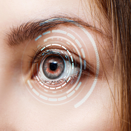 Digital female eye in process of scanning.の写真素材