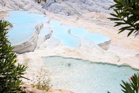 Travertines with turquoise water in Pamukkale.の写真素材