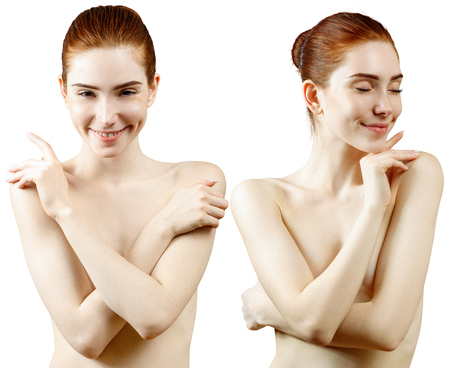 Lovely naked redhead woman covering her breast .の写真素材