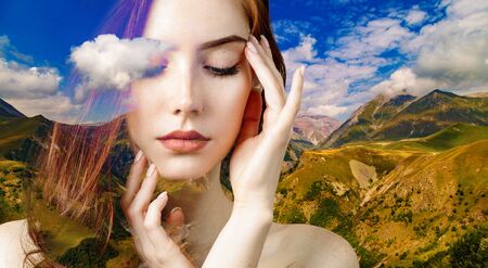Double exposure of young woman and beautiful nature.の写真素材