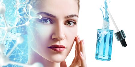 Young woman near blue cosmetics bottle under blue water splash.の写真素材