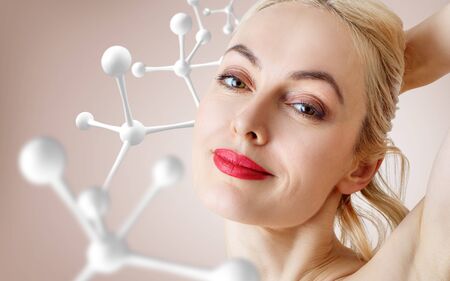 Beautiful sensual woman near big white molecule chain.の写真素材