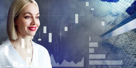 Attractive business woman over forex trading graph background.の写真素材