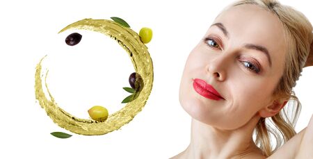 Beautiful woman near circulate olive oil. Skincare concept.の写真素材
