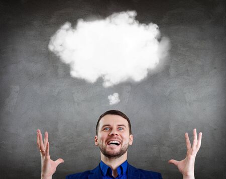 Businessman feels triumph with white cloud for minds.の写真素材