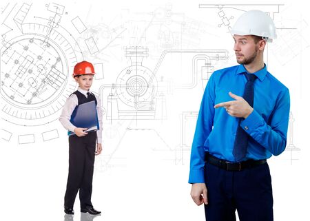 Man in hardhat and construction sketches at blue background.の写真素材