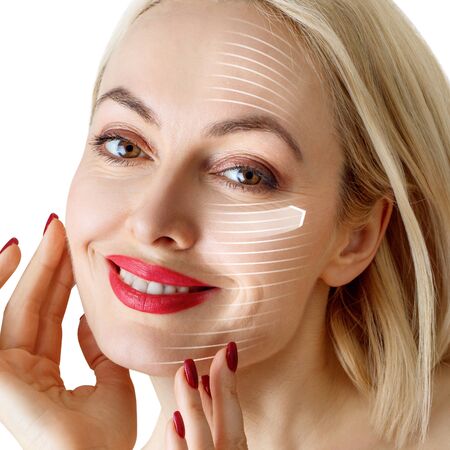 Graphic lines shows facial lifting effect on skin of beautiful woman.の写真素材