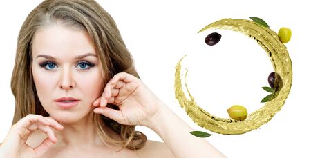 Beautiful woman near circulate olive oil. Skincare concept.の写真素材