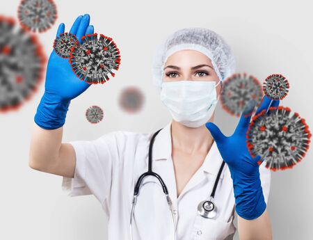 Female doctor control by hands viral cell coronavirus.の写真素材
