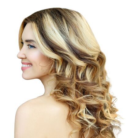 Beauty portrait of blonde woman with wavy hair.の写真素材
