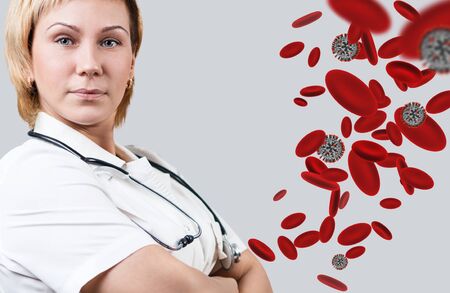 Adult female doctor near coronavirus in blood.の写真素材