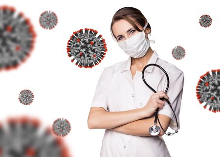 Young woman doctor among viral cells coronavirus.の写真素材