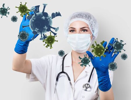 Female doctor control by hands viral cell coronavirus.の写真素材