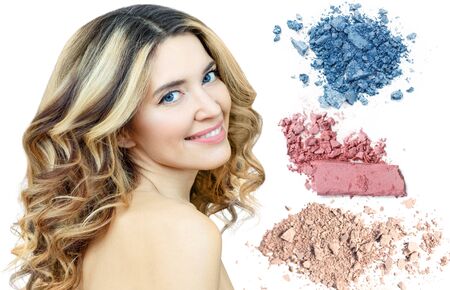 Beautiful woman with colorful samples of eyeshadows.の写真素材