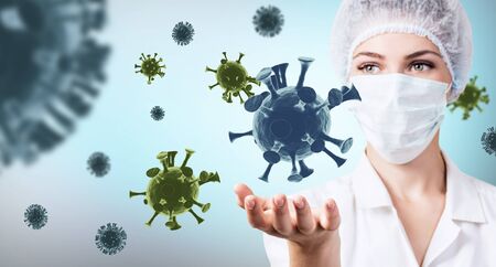 Female doctor presents viral cell coronavirus among virus cells.の写真素材