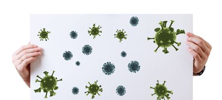 Hands holds white placard with illustration of coronavirus cells.の写真素材