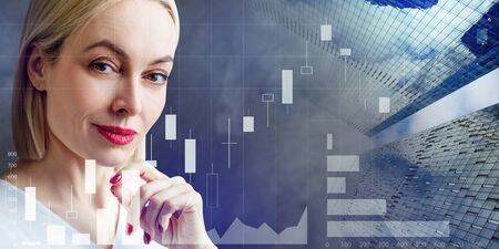 Attractive business woman over forex trading graph background.の写真素材