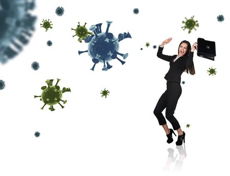 Young businesswoman panic among coronavirus cells.の写真素材