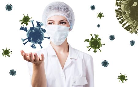 Female doctor presents viral cell coronavirus among virus cells.の写真素材