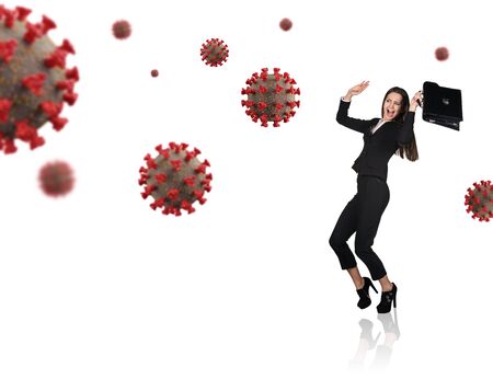 Young businesswoman screaming with fear among coronavirus cells.の写真素材