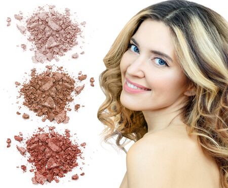Beautiful woman with colorful samples of eyeshadows.の写真素材