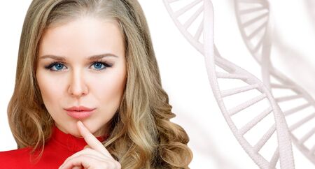 Portrait of sensual woman among white DNA chains.の写真素材