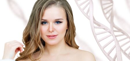 Portrait of sensual woman among white DNA chains.の写真素材