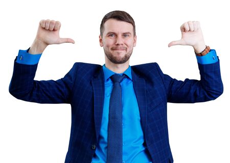 Smiling businessman pointing on himself by thumbs up gesture.の写真素材