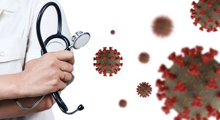 View on hands of doctor among viral cells coronavirus.の写真素材