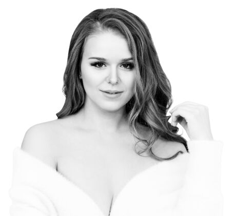 Beautiful blonde woman in white cashmere jacket.の写真素材
