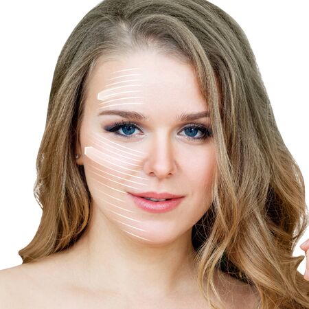 Graphic lines shows facial lifting effect on skin of beautiful woman.の写真素材