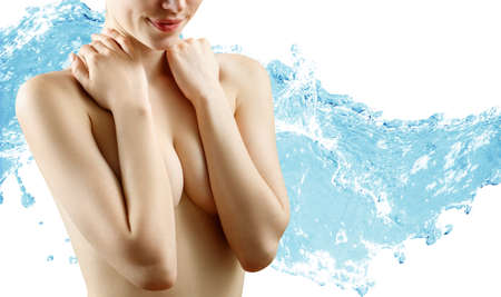 Sensual naked woman under water splash with fresh skin.の写真素材