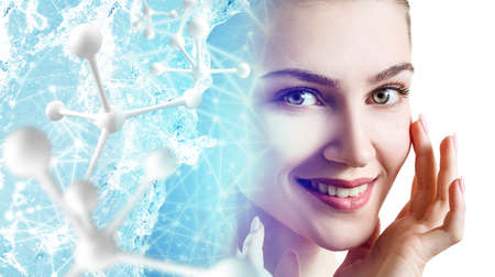 Beautiful woman near big white molecules.の写真素材