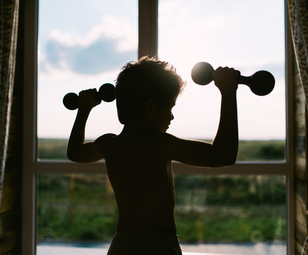 The guy is doing bodybuildingの写真素材